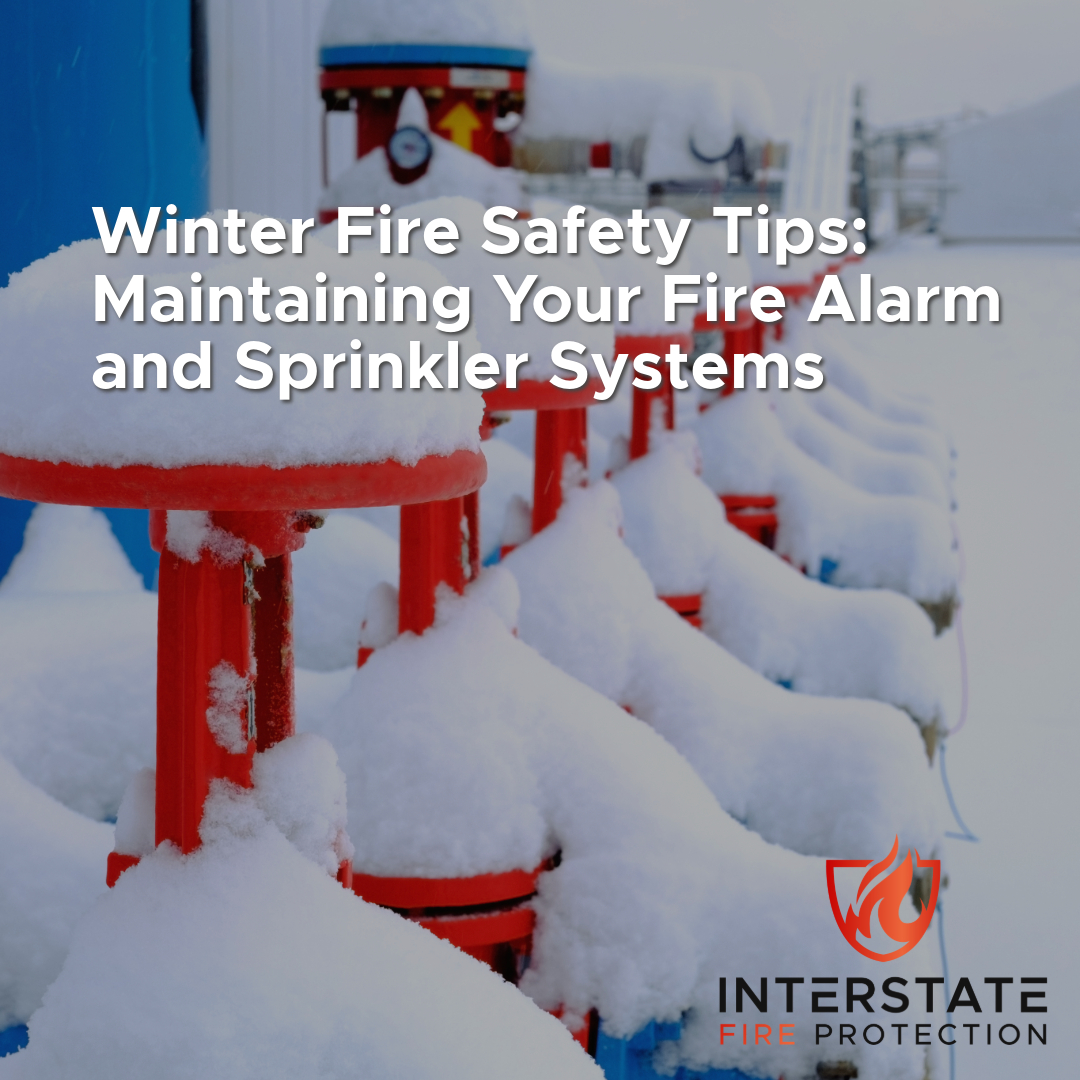 Snow-covered fire safety valves outdoors, highlighting the importance of maintaining fire alarm and sprinkler systems during winter. The text reads, "Winter Fire Safety Tips: Maintaining Your Fire Alarm and Sprinkler Systems" with the Interstate Fire Protection logo at the bottom right.